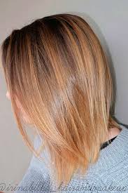 Asymmetric layered hair dyed in red and dark brown highlights with former covering small patches and the latter a heavier part of it for a stylish look. 33 Flirty And Effortless Ways To Rock Golden Brown Hair