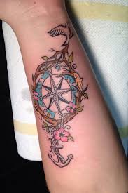 Despite the life secured by the compass and anchor, she never hides the longing for flying as a bird. 48 Best Anchor Compass Tattoos