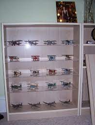 I use book shelves for the few models which i display in my hobby room. Modular Display Cabinets