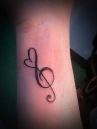 Even if you don't play music, you likely listen to it, so it's easy to feel a connection to its symbols. 99 Creative Music Tattoos That Are Sure To Blow Your Mind