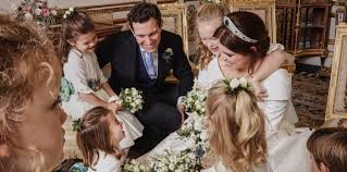 Princess beatrice of york (second left) sarah ferguson (centre), princess eugenie of york (second from right) and prince andrew, duke of york the duke and duchess of york arriving at all saints church in odiham in hampshire, for the service of thanksgiving and funeral of major ron ferguson. Princess Eugenie Shares Behind The Scenes Wedding Photo Of Bridesmaid Princess Charlotte On Instagram