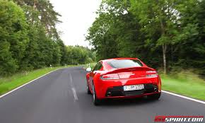 Image result for Magma Red 2012 Aston Martin