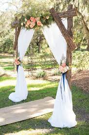Decorated Wedding Arches Beautiful 25 Chic And Easy Rustic Wedding Arch Ideas For Diy Brides Outdoor Wedding Decorations Wedding Arch Rustic Wedding Arbors