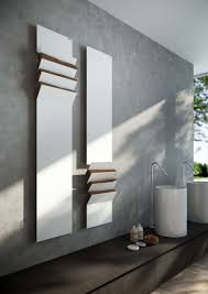 Modern bathrooms are known to offer a simplistic and clean feel but this unusual design takes the concept a step further with large tiles, clean lines and a touch of nature's. 21 Towel Heather Ideas Towel Warmer Towel Radiators