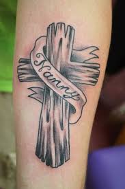 Christian in memory of tattoos. Wooden Cross With Ribbon Tattoo On Forearm In Memory Of Nanny