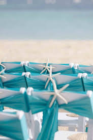 Ornaments & garlands nautical holiday decorations. Bahamas Wedding By Stop Motion Productions Beach Wedding Reception Wedding Chairs Wedding Chair Decorations
