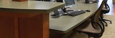 Pretty li'l posies // faux granite countertops. Office Cabinets Custom Reception Counter Heartland Design Iowa
