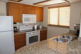 They include a kitchen or a kitchenette equipped with a microwave and a refrigerator. Two Bedroom Two Bath Polo Towers By Diamond Resorts Las Vegas Condo Rentals