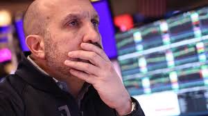 Dow rebounds from steep decline to finish with 100-point loss after Trump… 