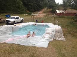 When It Gets Hot In Arkansas We Improvise Imgur Diy Swimming Pool Backyard Fun Hay Bale Pool