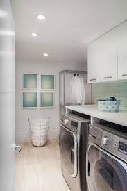 Check spelling or type a new query. Green And White Laundry Room With Tile Backsplash Modern Laundry Rooms Laundry Room Design Laundry Room Decor