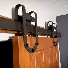 Horse Shoe Design On A Flat Track Bronze Finish Door Hardware Interior Interior Barn Door Hardware Indoor Barn Doors