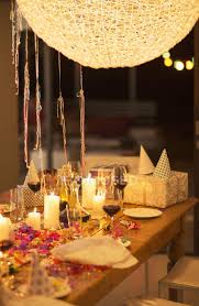 Effortlessly plan your dinner party, and enjoy a wonderful evening with friends and loved ones. Candles And Gifts On Table At Birthday Party Streamer Dinner Stock Photo 199382998