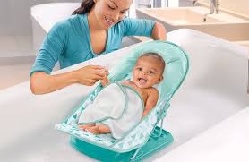 Bather setup folding the bather wn until it locks t e ! Summer Infant Deluxe Baby Bather With Warming Wings