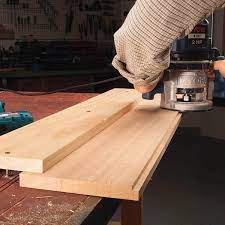 Here S A Slick Way To Clamp Boards For Edge Routing It S A Bridge Clamp That Lets You Rout The L Woodworking Workbench Woodworking Designs Learn Woodworking