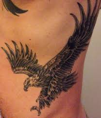 Bird Tattoo On Ribs Men Black And Grey Eagle Tattoo On My Ribs Eagle Tattoo Rib Tattoo Tattoos For Guys