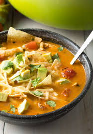 Add all the ingredients, except the cheese, corn tortilla strips and avocados to your crock pot. The Best Chicken Tortilla Soup Recipe Video A Spicy Perspective