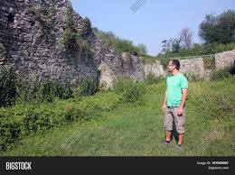 Exista o parte veche de oras absolut deosebita. Tourist Visiting Ruins Image Photo Free Trial Bigstock