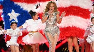 Lo told vogue about her decision to wear that iconic gown, sharing that she actually chose it the day of the awards show. Super Bowl Jennifer Lopez Stuns In Versace With Political Flag Statement 27k Crystals And Sequins Hollywood Reporter