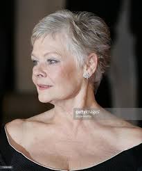 Actress Dame Judi Dench arrives at the Orange British Academy Film Awards  (BAFTAs) at the Royal Opera House