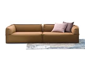 Blunt blocks rounded and smoothed by some imaginary blade. M A S S A S Sofa Von Moroso Stylepark