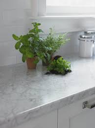 White Kitchen With A Formica Laminate Carrara Bianco Countertop Click Through To Formica Kitchen Countertops Laminate Countertops Kitchen Remodel Countertops