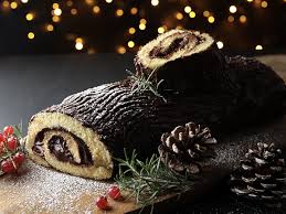 Bûche de noël is a rolled up cake with ganache frosting shaped like a log, often with woodland elements. Recipe Round Up Les Buches De Noel French Cultural Center