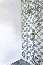 Such A Statement Mosaic For The Shower Wall We Love The Slate Blue Charcoal Gray Tile Color Erin Sander De Shower Accent Tile Tile Accent Wall Shower Tile