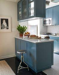 So if you have light brown overhead cabinets, you can use a darker shade of brown for the kitchen island, while keeping the countertop uniform for both. Suspended Kitchen Cabinets Design Ideas