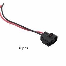 An ignition coil transforms ignition voltage (12 volts) to the very high voltage pulses (20,000 volts or more) that fire the spark plugs. 6pcs Ignition Coil Connector Pigtail Plug Harness For Toyota Camry Mazda Lexus