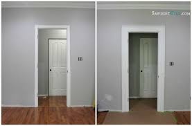 Making a doorway with a door. Create Awesome Door And Window Trim Molding By Layering Sawdust Girl Home Upgrades Home Diy Home Improvement