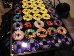 Initially i did all the normal stupid things with them that we all did, but then i decided to aim higher, to use all the cd's in one giant project. Cd Coffee Table 5 Steps Instructables
