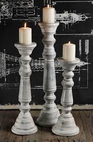 Create a glowing ambience and set the mood with unique candle holders. Wood Pillar Candle Holder Set Of 3 White Wood Pillar Candle Holders Wooden Pillar Candle Holders Candle Holders