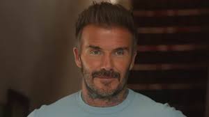 David Beckham leaves the ladies swooning as he films new Walkers advert  with fellow footballing icon Thierry Henry