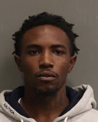 Suspect charged after firing gun in populated area, police say