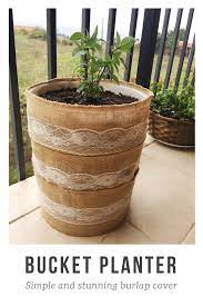 We recently moved into another home and i'm still planning some landscaping ideas for the partially completed back yard. Turn A 5 Gallon Bucket Into A Planter For Your Potted Garden It S As Simple As Wrapping Pieces Of This Burlap Table Lini Bucket Gardening Planters Garden Pots
