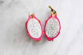 Although dragon fruit may not feature regularly on your grocery list, this brightly colored fruit, with its white flesh and black seeds, may be worth a taste if you're looking to change things up. What Is Dragon Fruit
