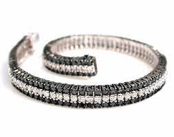 First of all, let's it simply gets absorbed, which makes the diamond black. 18k White Gold 3 Row Black White Diamond Tennis Bracelet Only 5 995 00 Black Diamond Jewelry