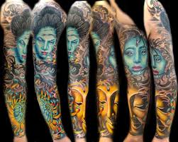 Amazing Sleeve With A Buddha Tattoo On Forearm Cool Tattoos Celebrity Tattoos Best Tattoo Ever