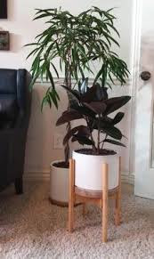 Shop wayfair for a zillion things home across all styles and budgets. Jenor Metal Plant Pot Stand Flowerpot Base Holder Rack Round Indoor Outdoor Home Decor Garden Outdoors Gardening