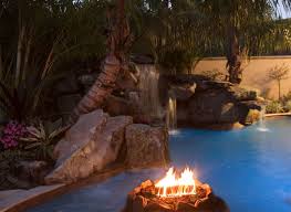 View five sizzling pools with fire features. Lucas Lagoons Pool With Spa Grotto Waterfall And Fire Pit