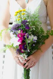 White, yellow, orange, pink, red, purple. Wedding Wildflower Arrnagements
