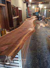 Then sand the sap wood (live edge) with a smaller headed sander to bring out the color and remove any bark or dirt. Natural Wood Countertops Live Edge Wood Slabs Littlebranch Farm Wood Countertops Wood Bar Top Bar Countertops