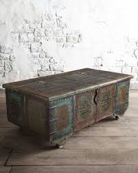 The natural barnwood is finished with a distressed turquoise color. Distressed Trunk Coffee Table Ideas On Foter