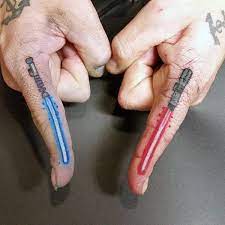 You cut out tattoo lightsaber and place on finger. 60 Lightsaber Tattoo Designs For Men Star Wars Ink Ideas