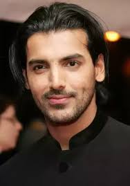 The electric blue color stands out perfectly against the dark hair, really bringing the hairstyle to life. What Are Some Great Hairstyles For Indian Men Quora