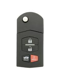 Once the metal key is removed, you'll notice a slot on either side of the key fob case. Mazda Key Fobs And Remotes