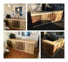 1001 Pallets Recycled Upcycled Pallet Ideas And Projects Pallet Counter Wooden Pallet Bar Wooden Pallet Furniture