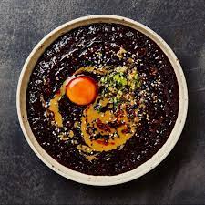 Yotam Ottolenghi On Instagram Black Rice Congee With Tahini Sauce And Cured Yolk Striking And Delicious Alo Ottolenghi Rice Congee Savory Breakfast Recipes