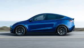 The model y can carry seven passengers and their cargo, and each second row seat folds flat independently. Wb997wi0rjycem